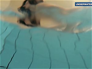 demonstrating bright funbags underwater makes everyone mischievous